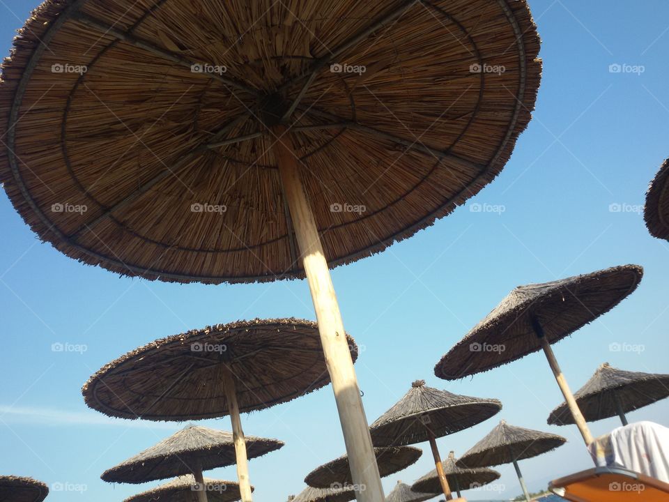 Umbrellas on the sand beach