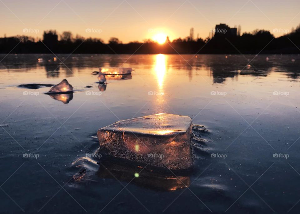 Pieces of ice on frozen lake 