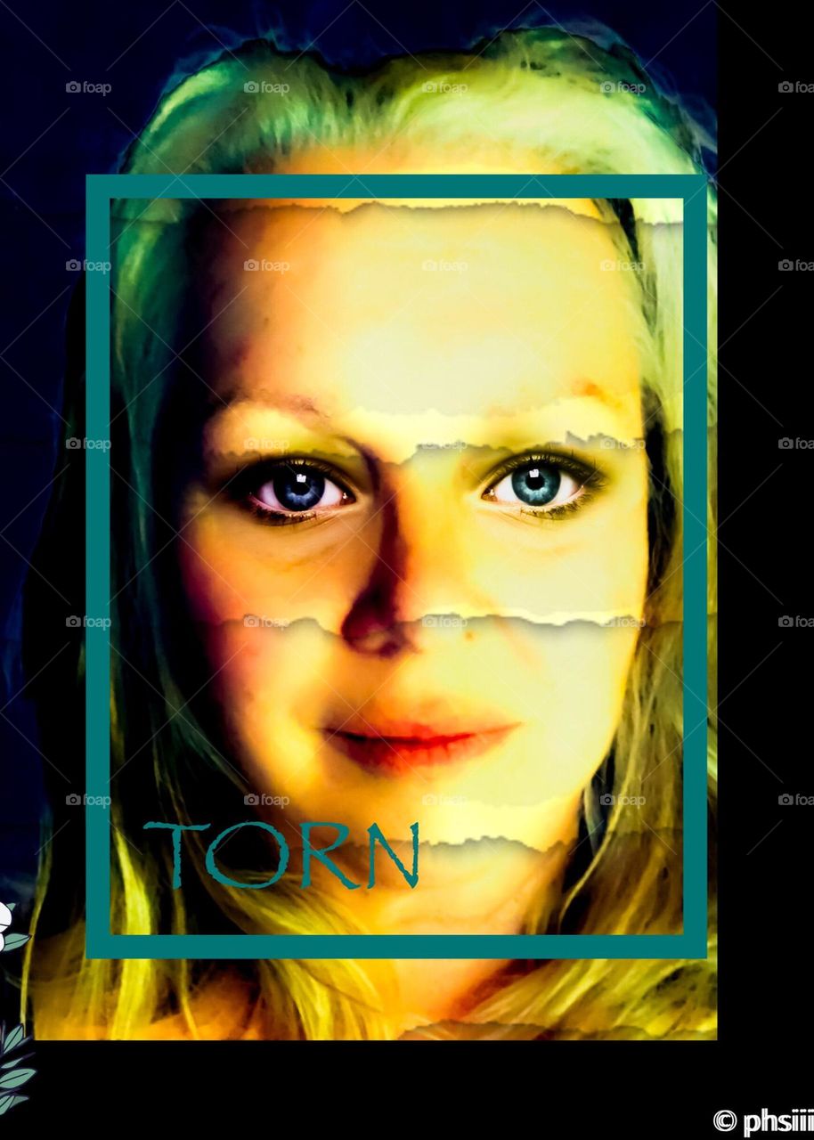 Photo editing with Photoshop Express. Portrait of a blue eyed, blonde woman framed with a teal flowered border, a torn paper texture, the word TORN on bottom corner and a dark background.