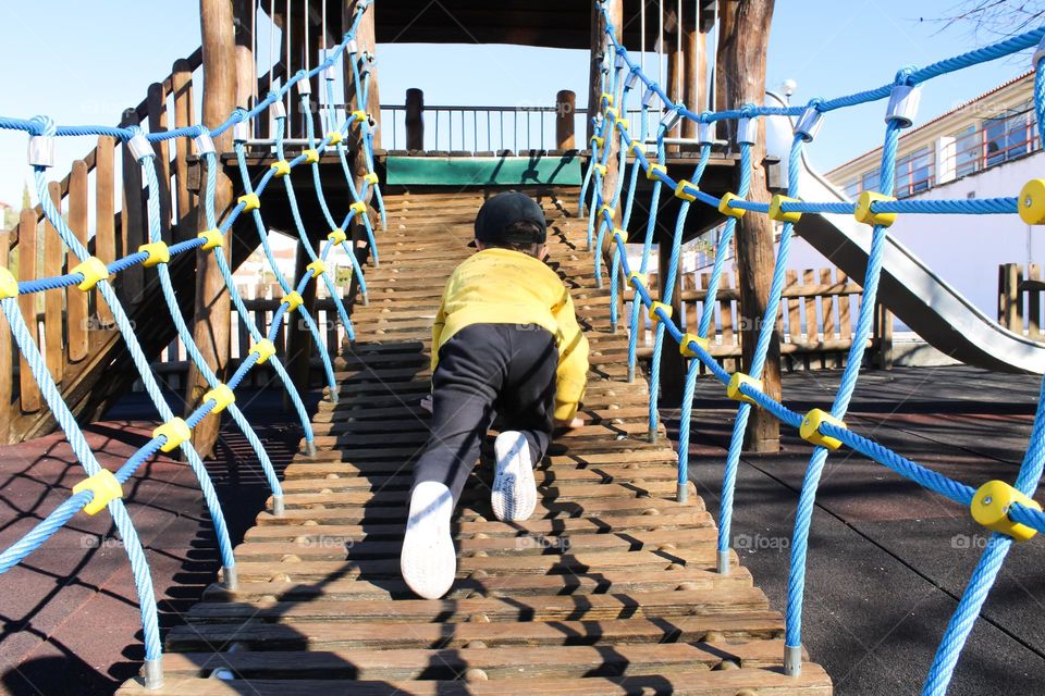 Child in playground, Portugal 2033