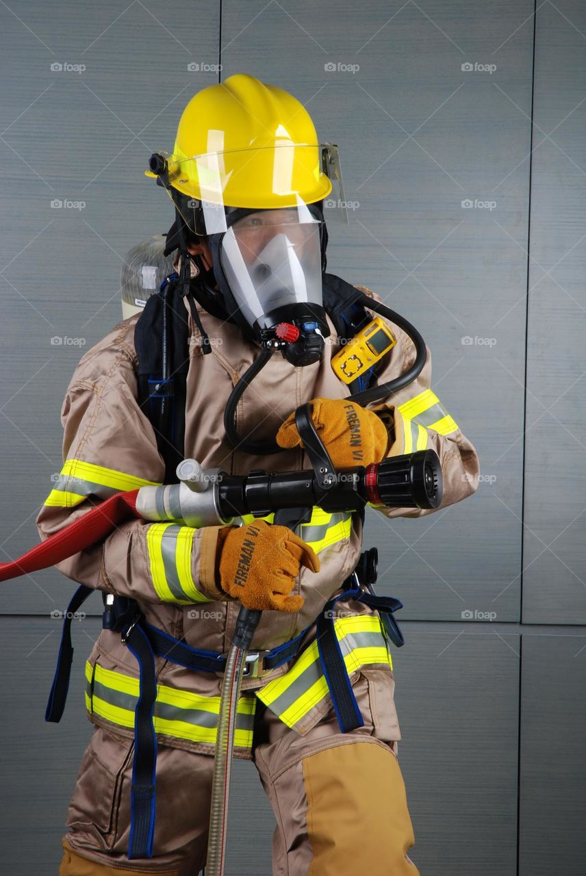 Photo of Firefighters ready to put out the fire