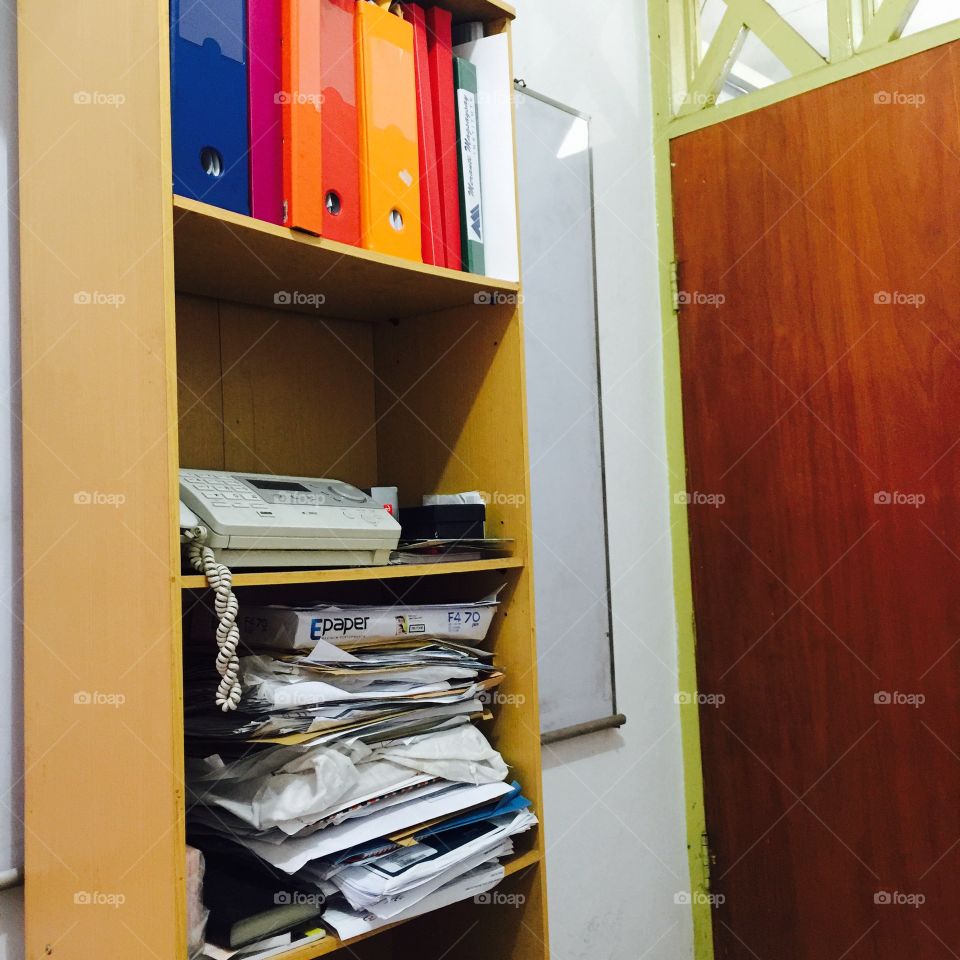 Messy office shelf 