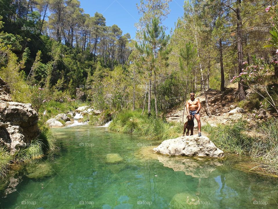 River#nature#trees#rocks#human#dog