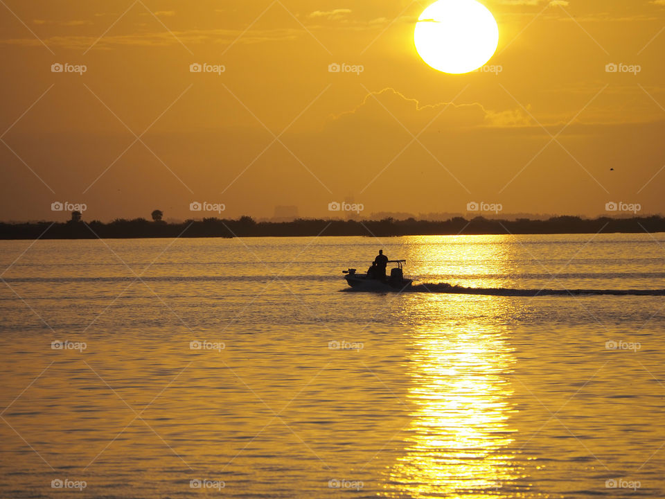 Boating at sunset