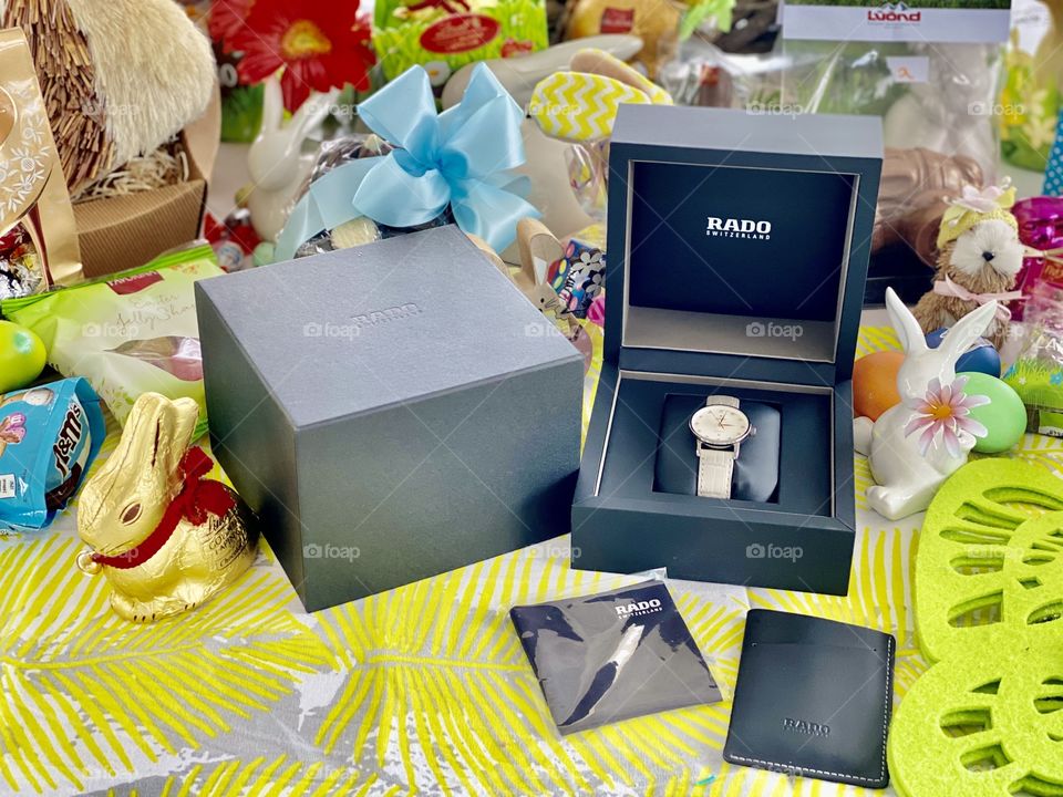 glad clock, glad clock as a gift for Easter, holiday gift Swiss clock glad, festive table, Easter, decorations on the table, joy, holiday, eggs, gifts