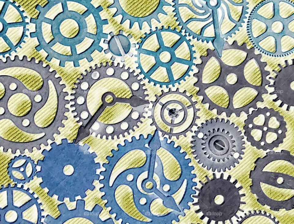 Inverted colour image of gears and clock hands