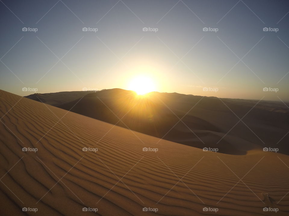 Sunset over the desert in Peru