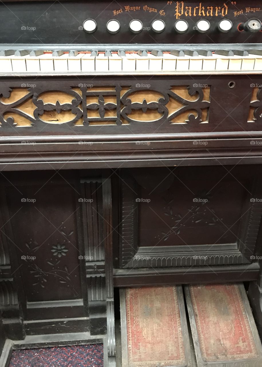 Antique organ tucked away in a corner 