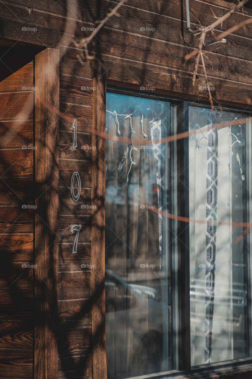 Reflective windows of shop.