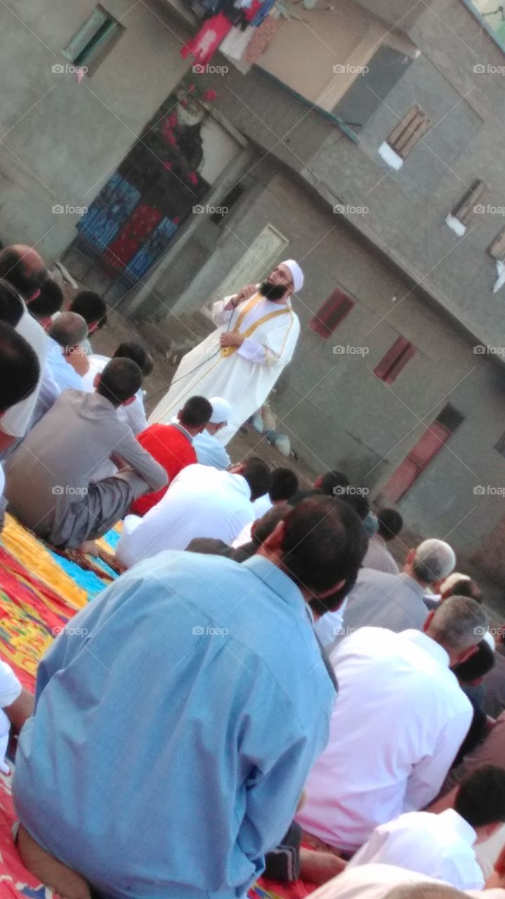 The imam of the mosque preaches the Eid al-Fitr sermon