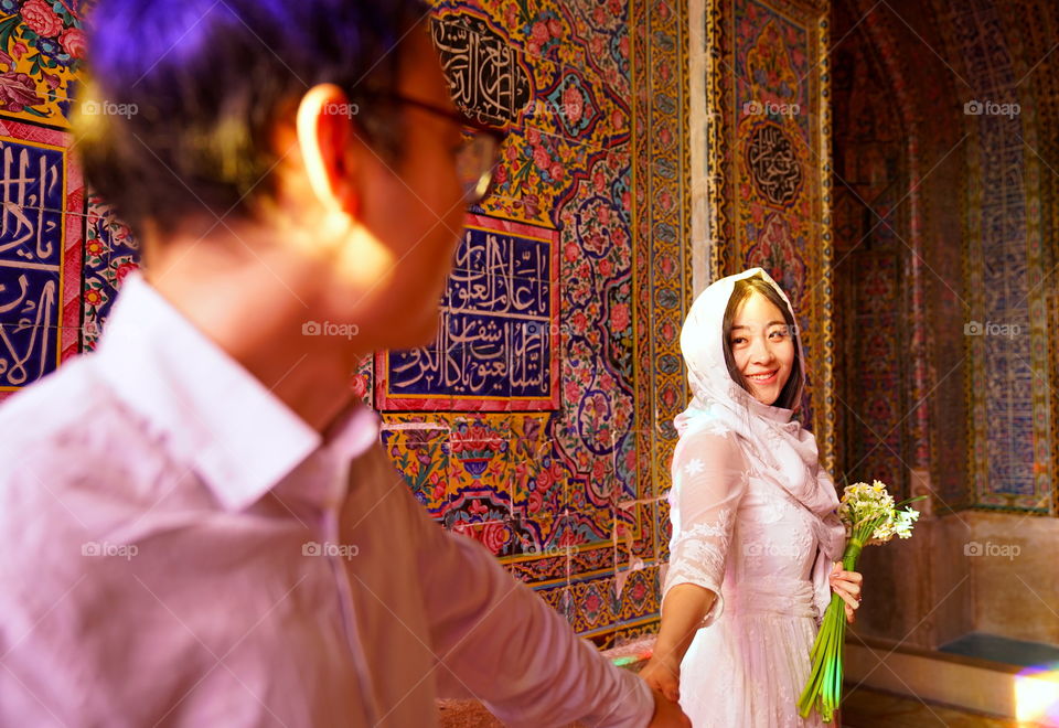 Wedding photoshoot in the famous pink mosque of Shiraz, Iran.