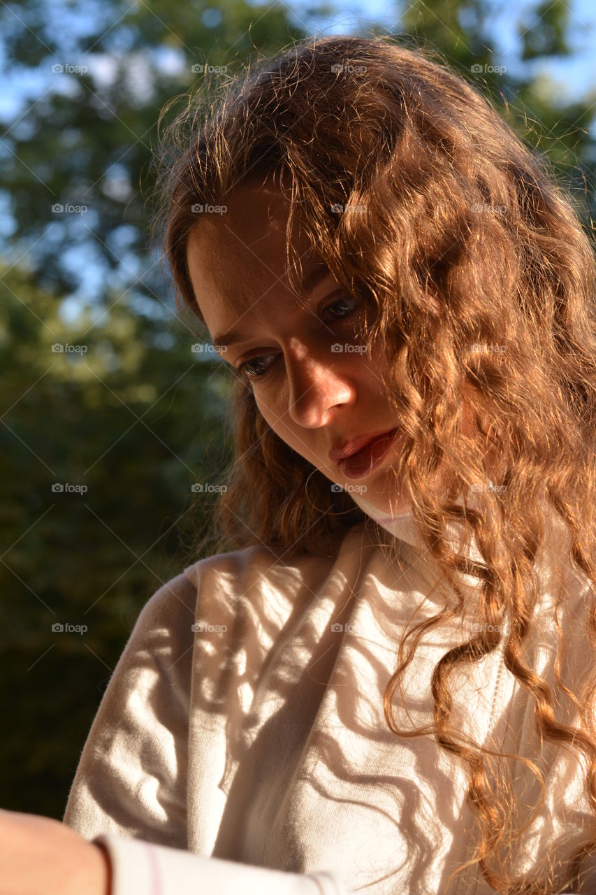 girl beautiful portrait close up in the sunlight