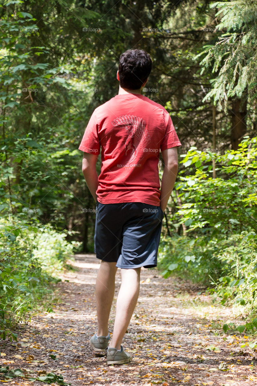 Man walking in the woods 