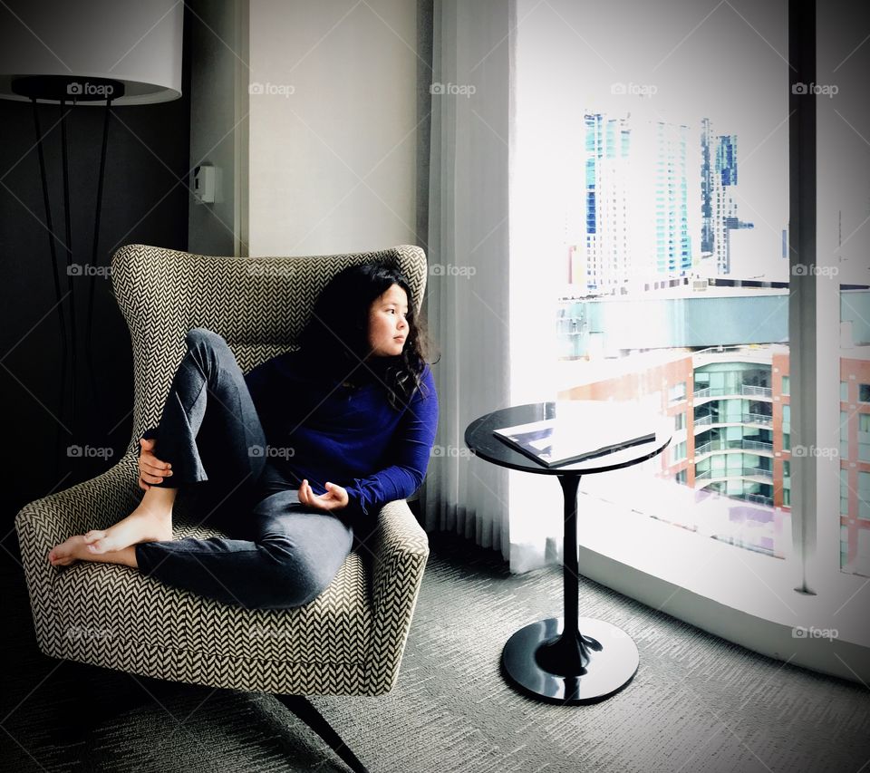 A girl with a view of the city