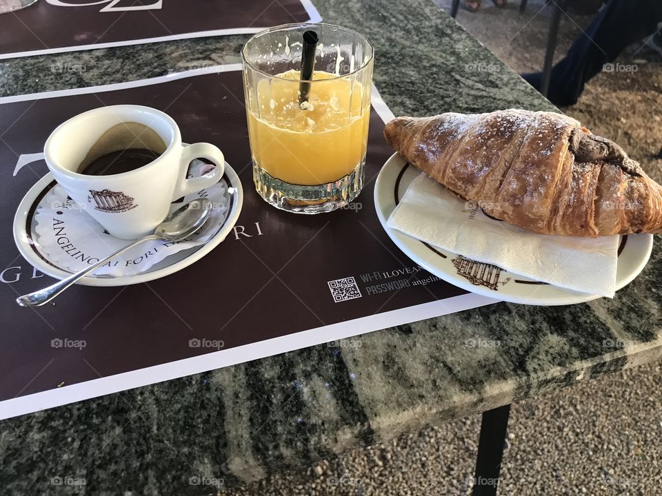 Espresso, orange juice and pastry.