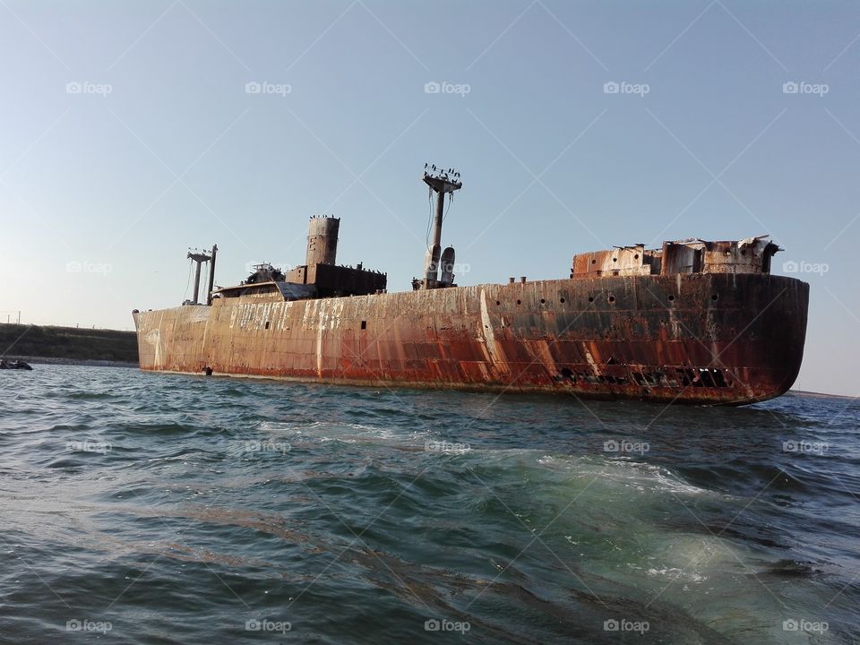 Old ship on sea