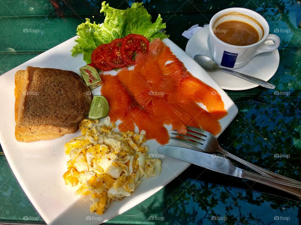 Favorite sandwich - Scandinavian style. Scrambled eggs, piece of bread and fish; and coffee, of course