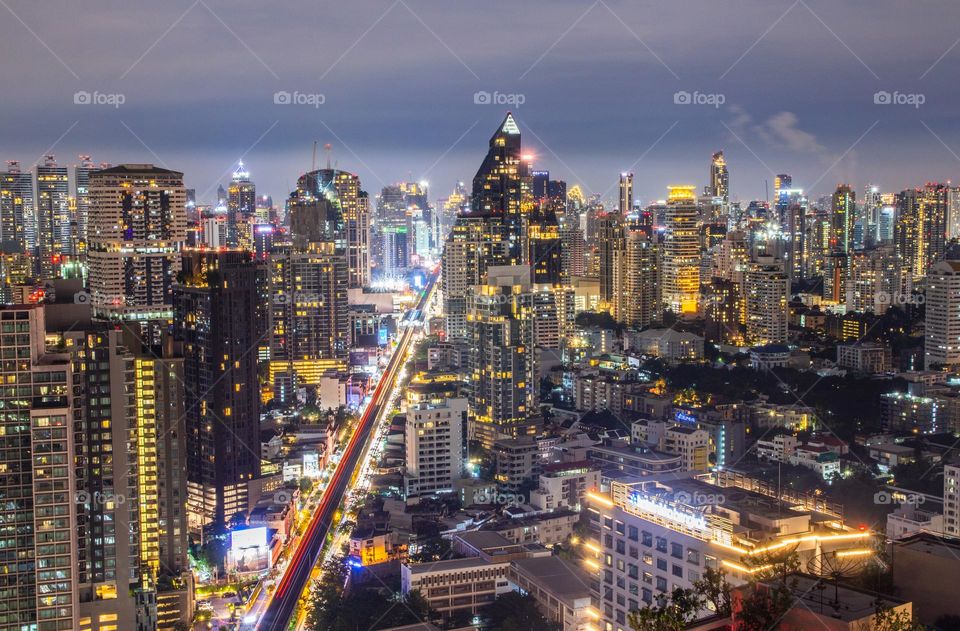 the Cityscape and the skyscrapers of the Metropolis Bangkok Thailand Southeast Asia in the Night Time