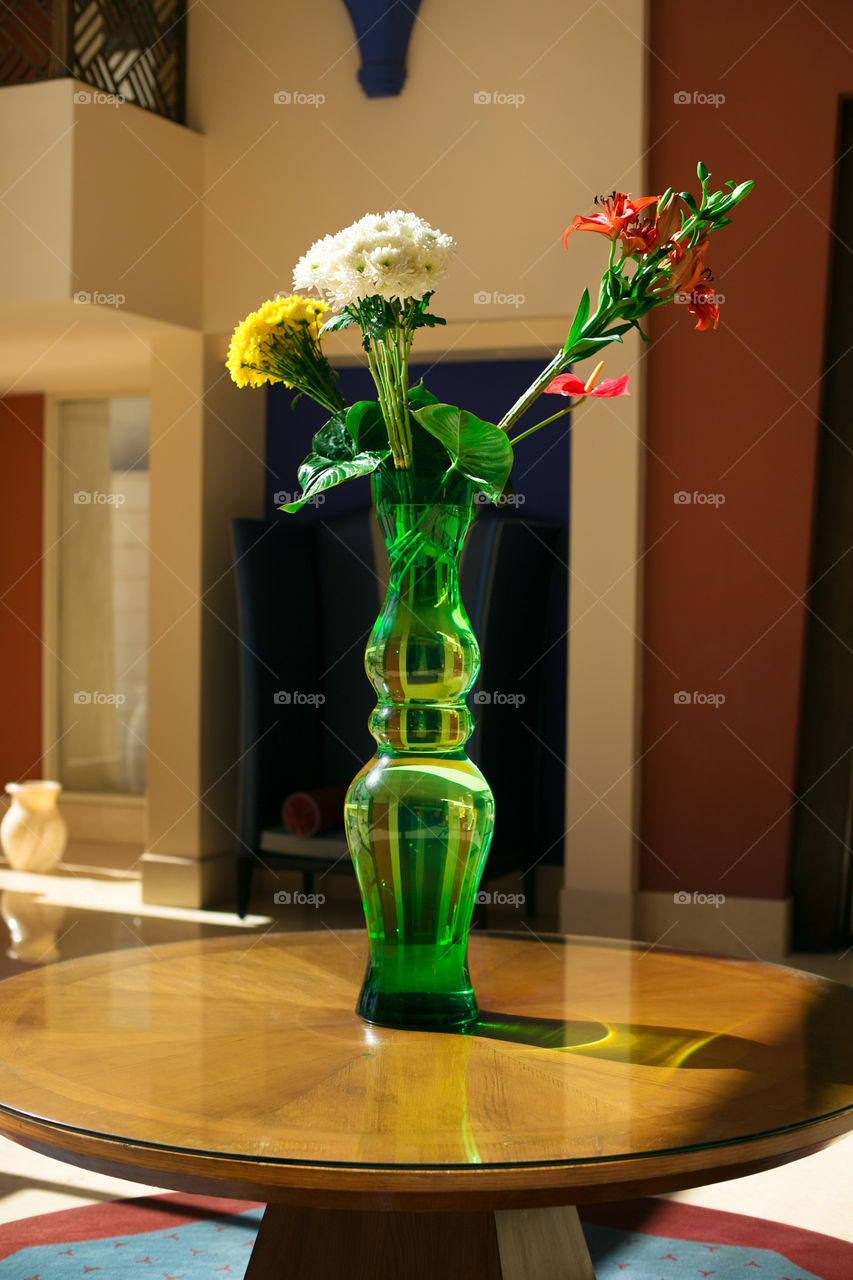 Close-up of flower vase on table