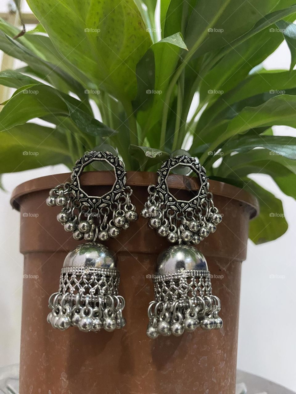 Elevate your style with a touch of tradition – embracing the beauty of Indian jhumkas.