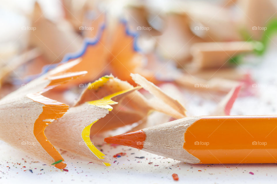 Close-up of orange colored pencil