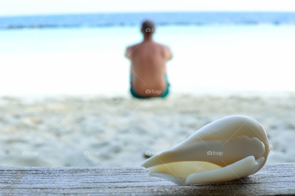 Relax on a tropical beach looking at the sea