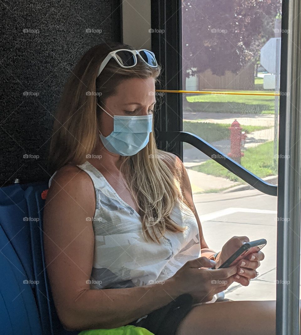 Beautiful woman with a face mask