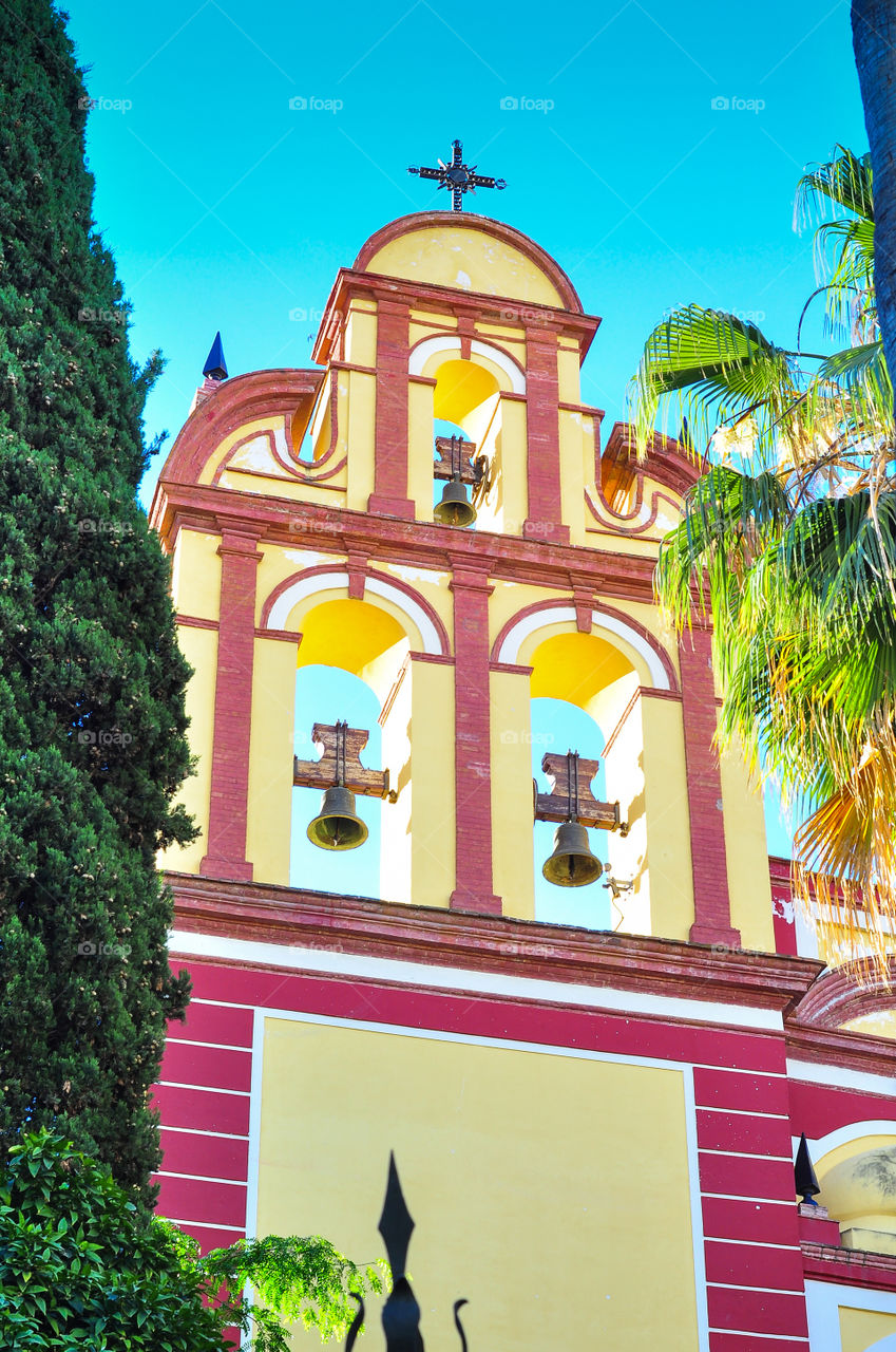 Spain top of the church with bells 