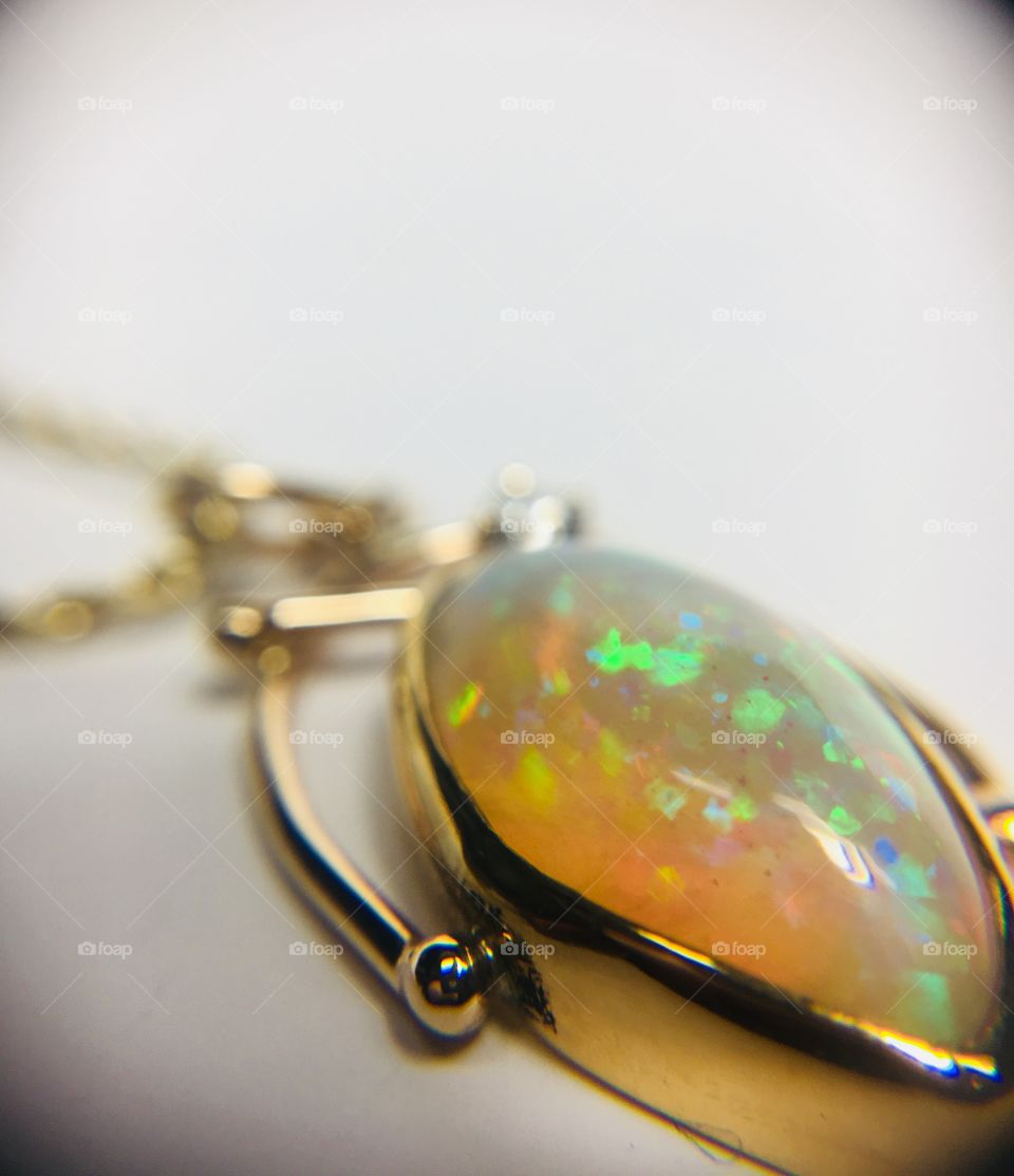 Opal in gold necklace 