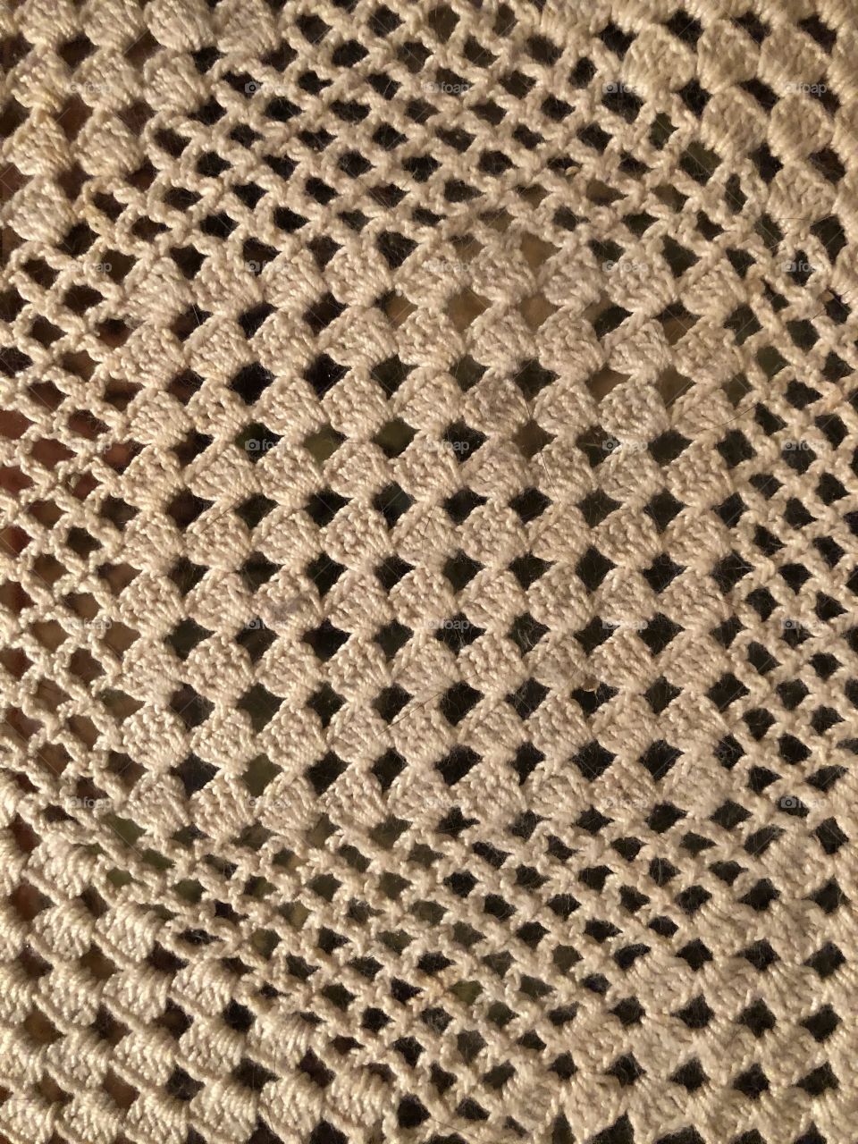 Symmetry found in old art of crocheting appealing to sense of vintage beauty