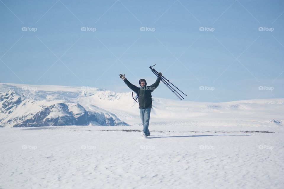 Man carrying tripod