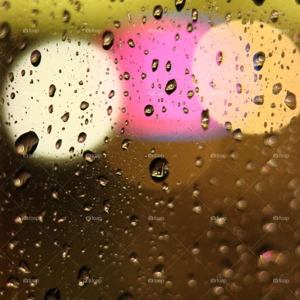 Nighttime raindrops on Window