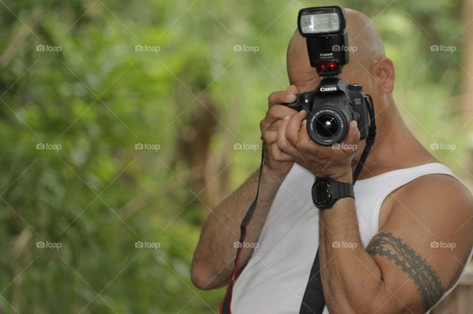 Nature Photographer In Action