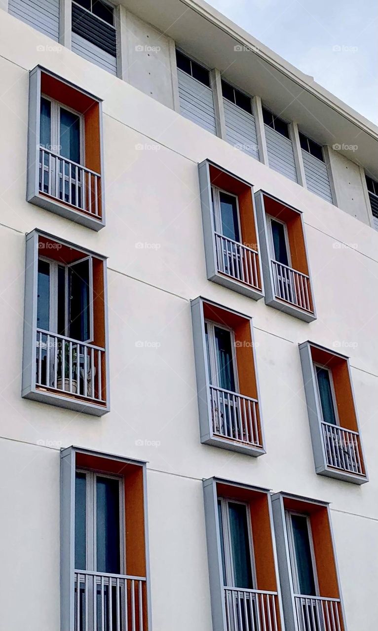 Facade of a building with red windows