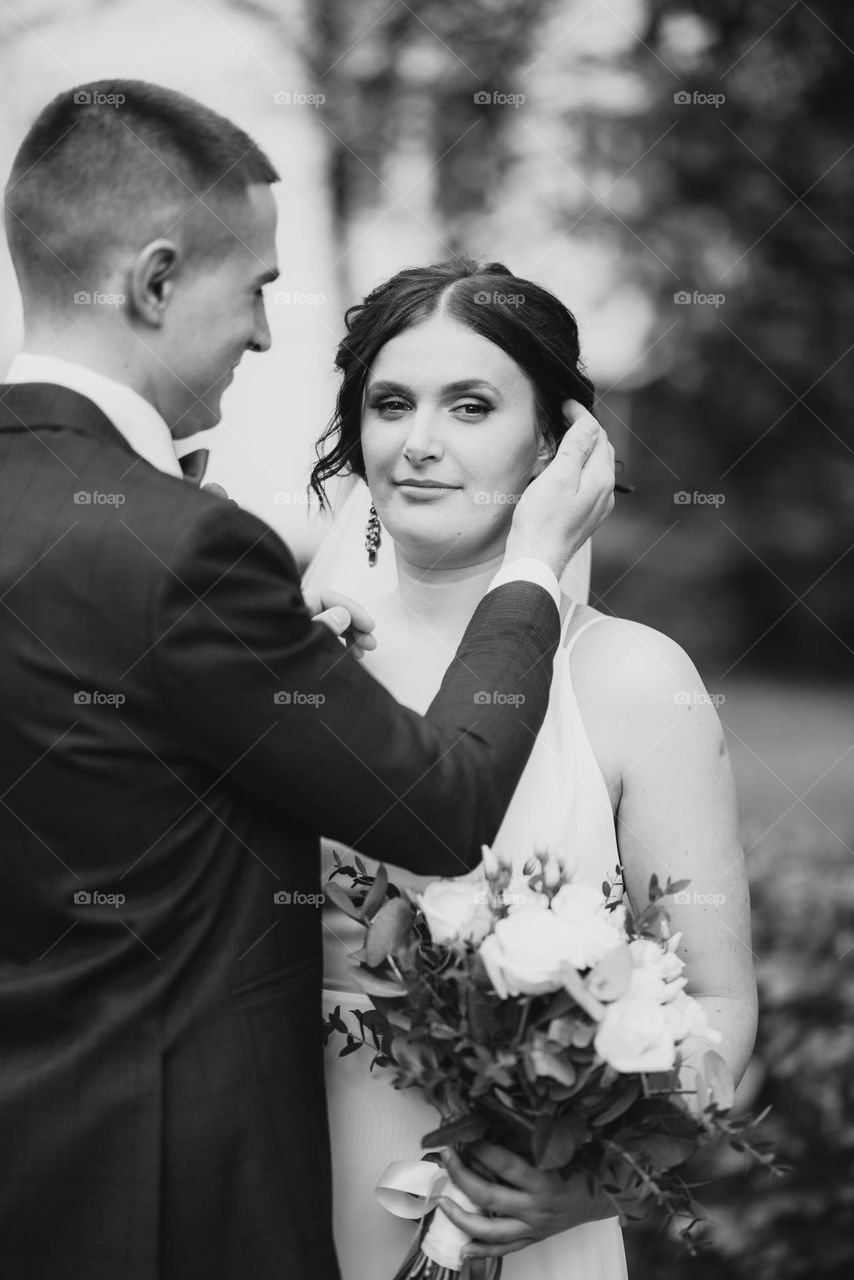 Black and white photo of the bride at the wedding