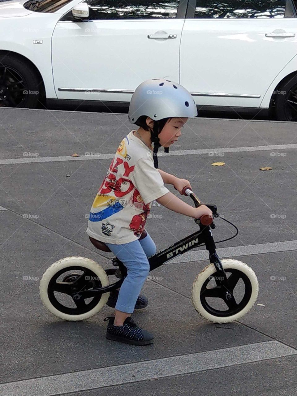 staying in good shape: boy learning biking