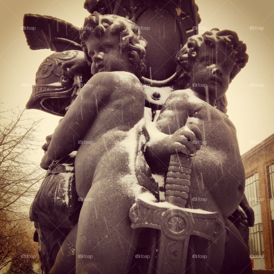 Statue of cherubs in winter, Osterley 