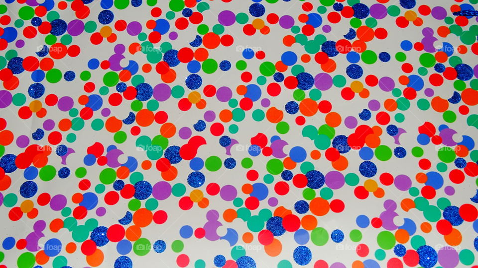 Multi-colored polka dots. Abstract textured background.