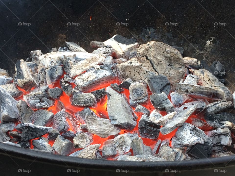 Weber kettle grill coals. 