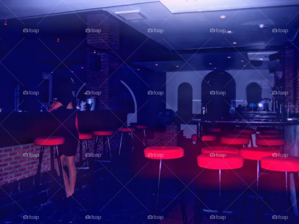 woman in empty bar