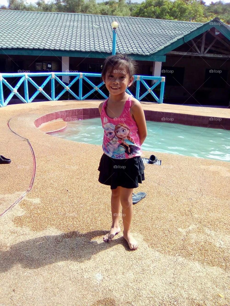 Our daughter Sheikha having such fun at her first family graduation pool party in The Philippines.