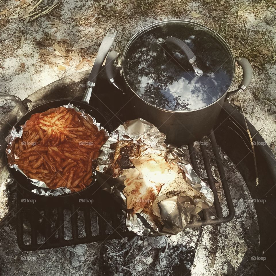 camping. cooking outside