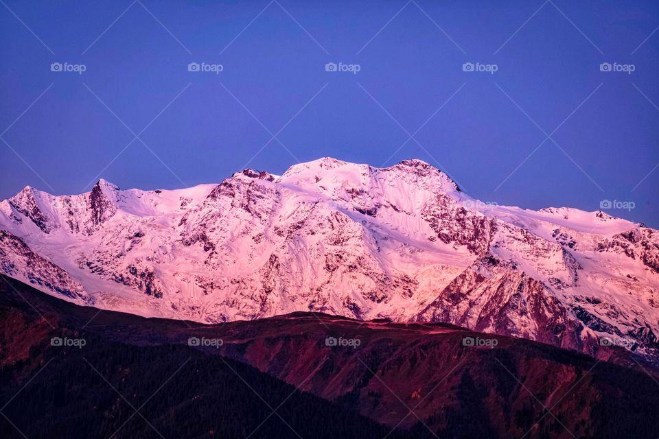 Snow mountain in morning twilight moment