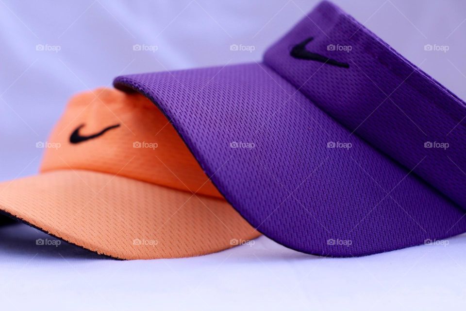 Purple and orange visors 