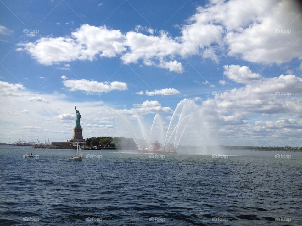 An unexpected water show by the Statue of Liberty in New York City