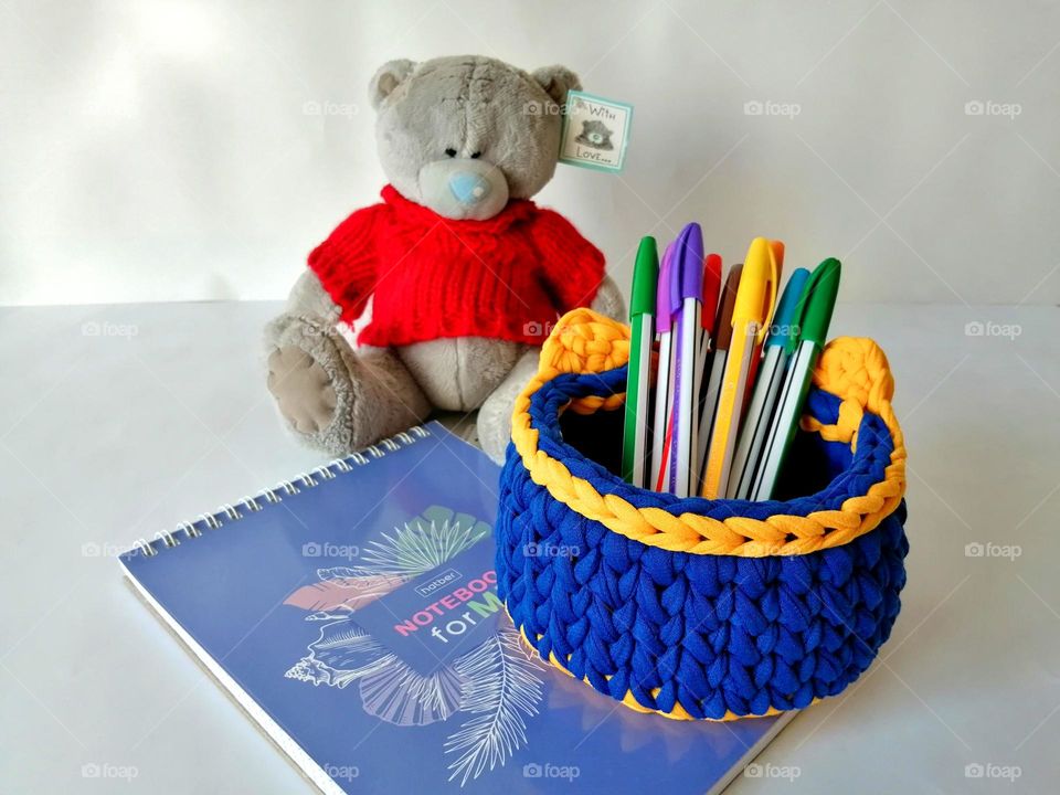 a teddy bear and a basket made by your own hands
