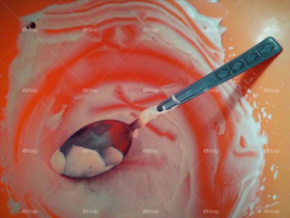 whipped cream and chrome spoon