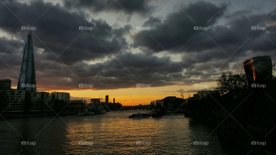 A stormy sunset over the River Thames.