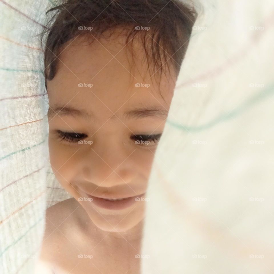 🍁During hide and seek when I caught him and he was trying to convince me for once more seeking him💞 by his smile.🙂