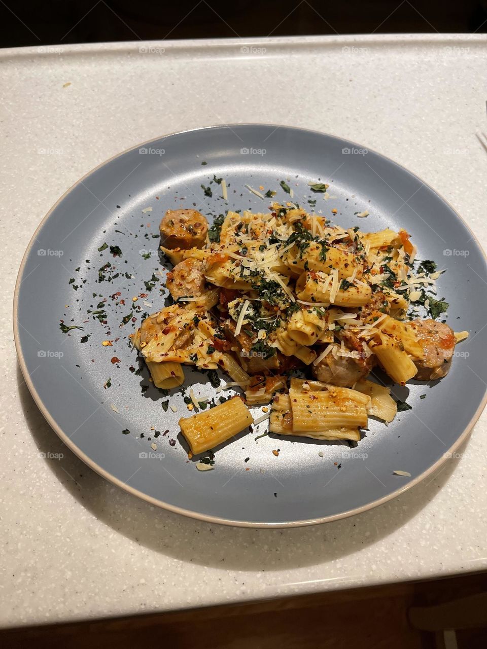 Mouth watering pasta, enliven the senses, creating food with love in harmony, basil and red pepper flakes make the eyes go wide, food served with family, make it at home and bring it to the table, with a mothers love a touch of joy with a smile. 